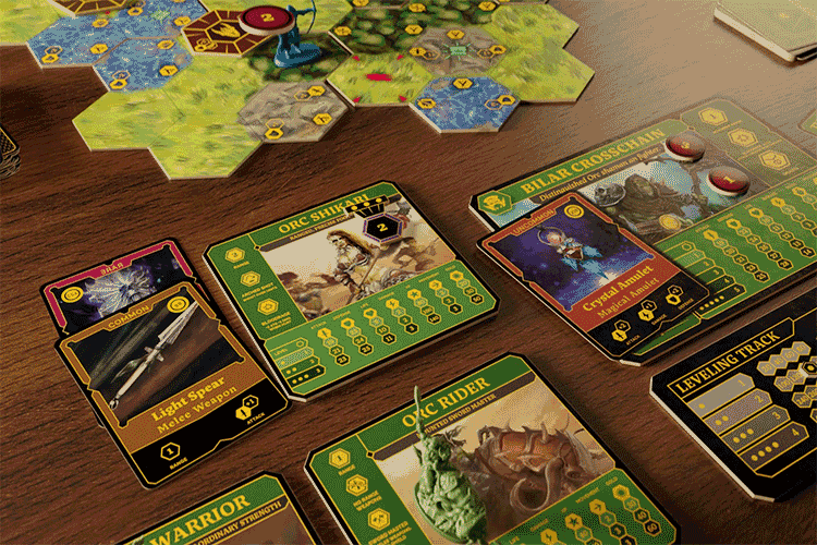 Boardquest gameplay — cards and hex board laid out on a table